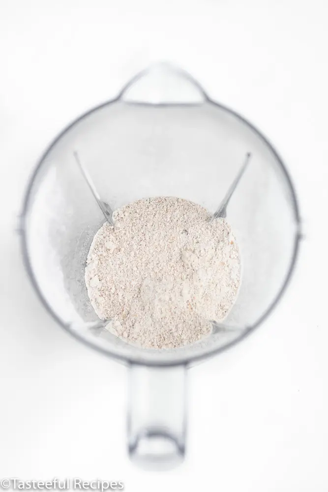 Overhead shot of oat flour in a blender
