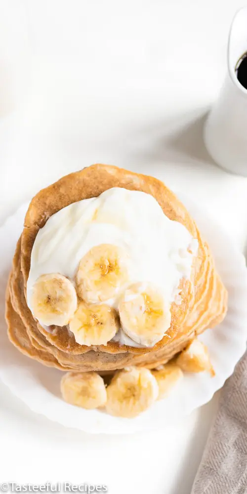 Overhead shot of a stack of peanut butter banana pancakes