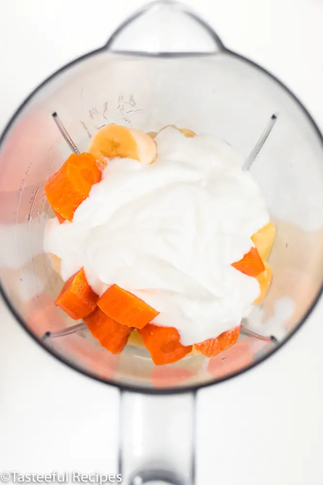 Overhead shot of a blender filled with ingredients