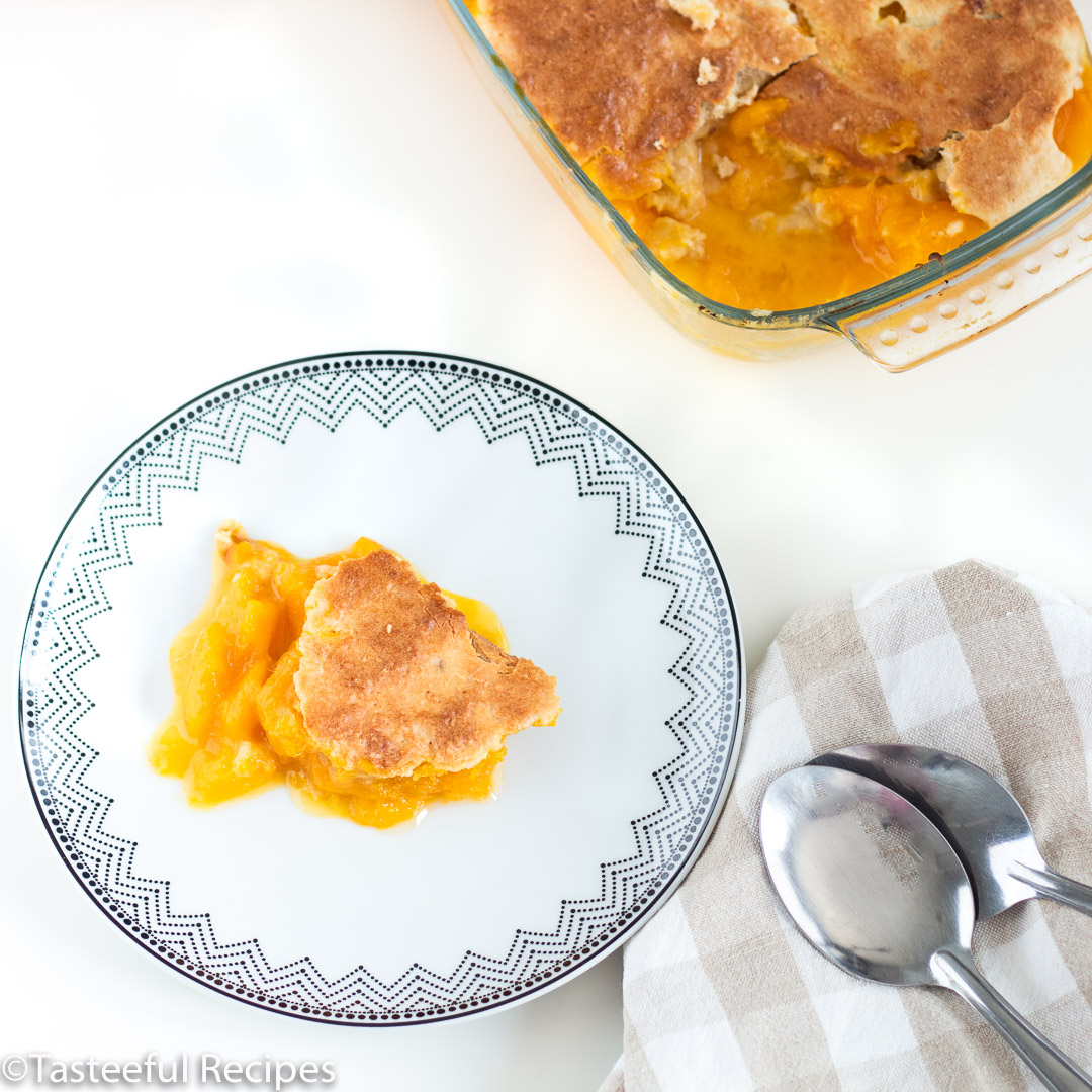 Overhead shot of coconut mango cobbler on a plate