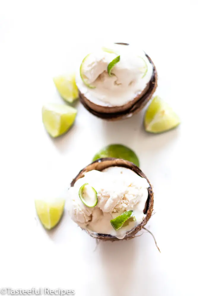 Overhead shot of coconut lime ice cream in a fresh coconut