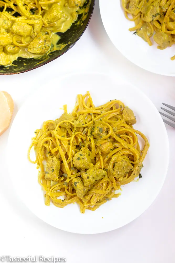 Overhead shot of creamy curry chicken pasta