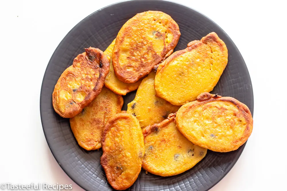 Overhead shot of a plate of Caribbean pumpkin fritters