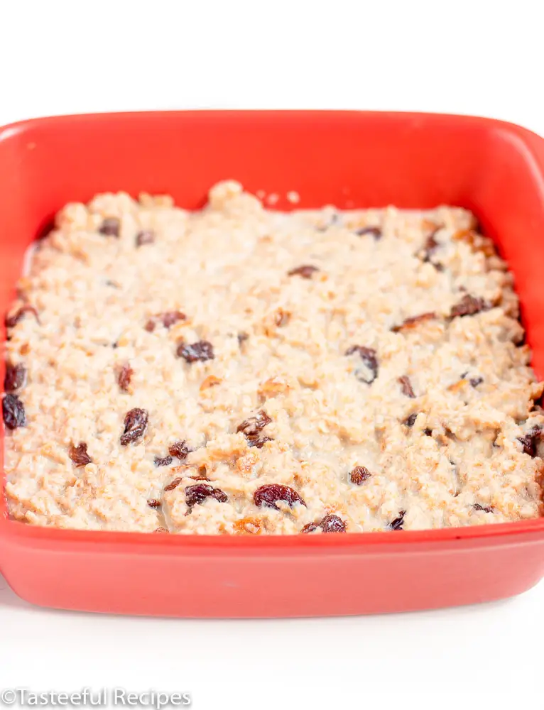 Straight on shot of a baking dish filled with a bread pudding batter