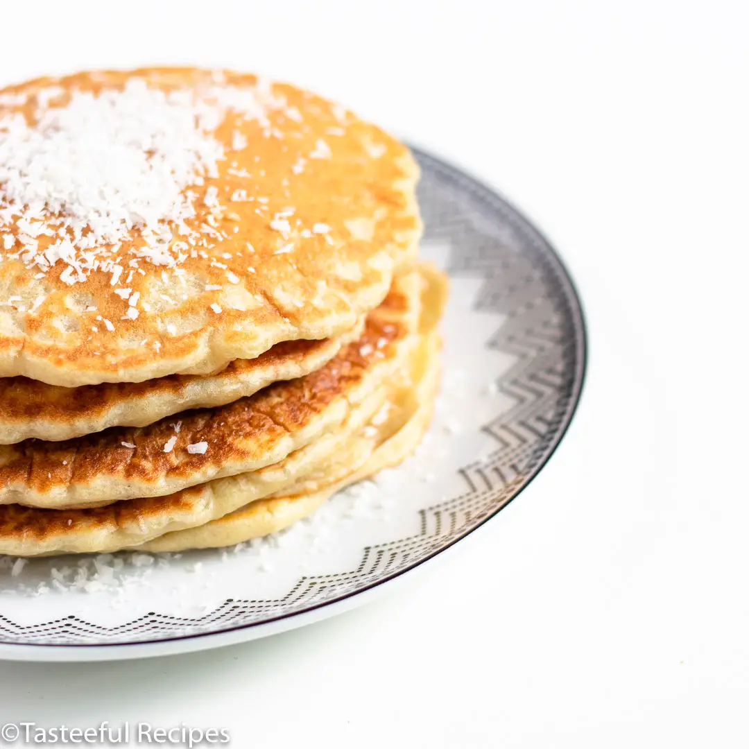 Straight on shot of a stack of coconut milk pancakes