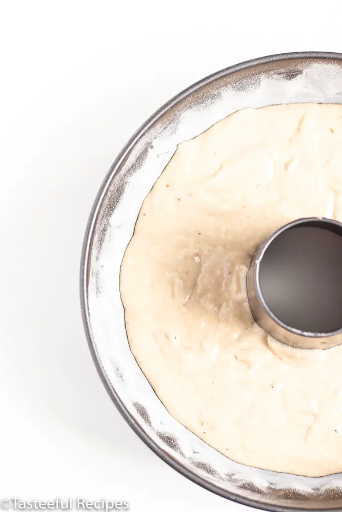 Overhead shot of a coconut plantain cake batter in a bundt pan
