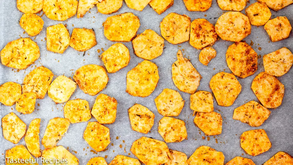 Overhead shot of a baking tray with plantain chips