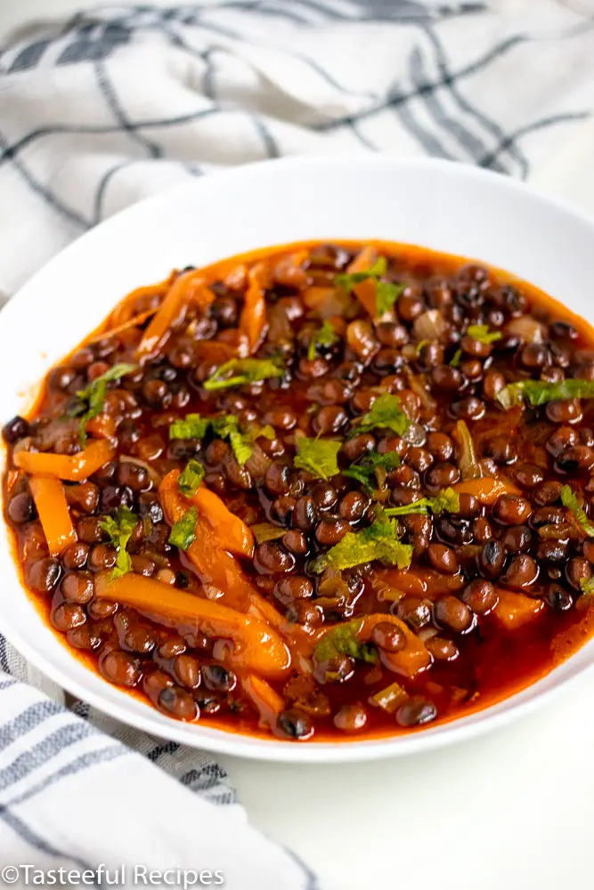 Angled shot of a plate of stewed dry pigeon peas