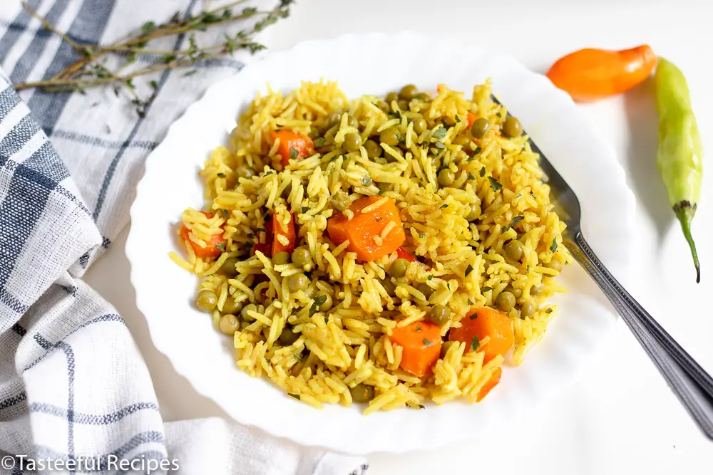 Angled shot of a plate of Caribbean seasoned rice