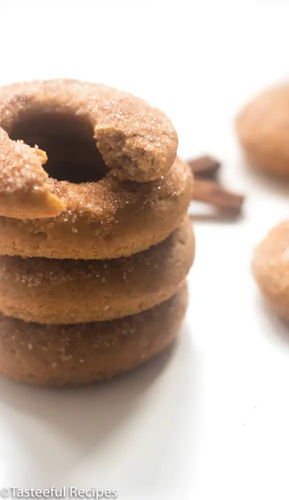 Angled shot of donuts stacked on each other