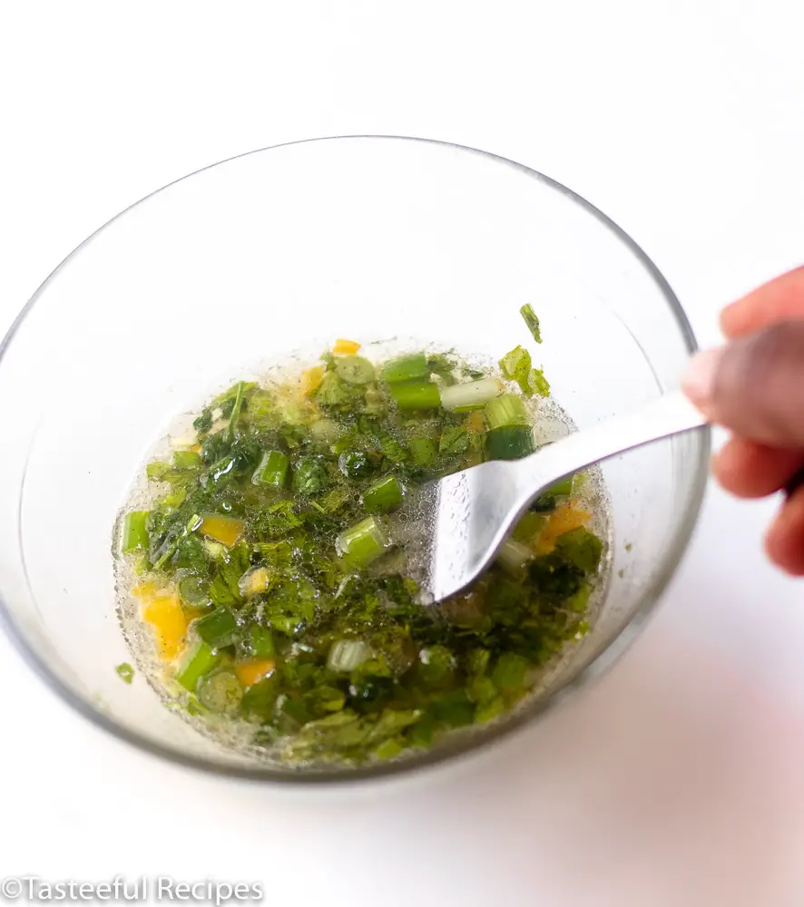 Caribbean salad dressing being mixed together