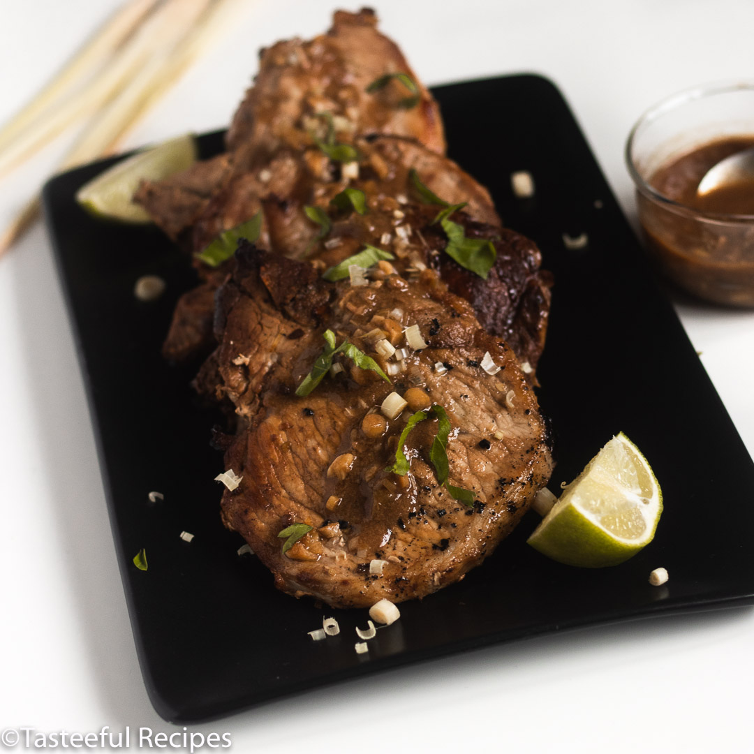 Straight on shot of a plate of lemongrass pork chops