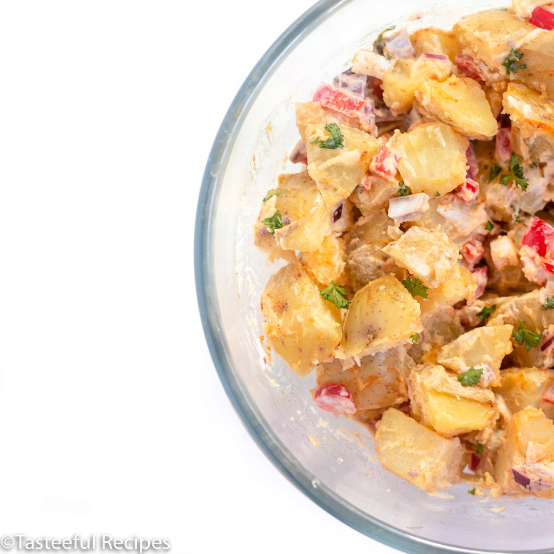 Overhead shot of a bowl of warm potato salad