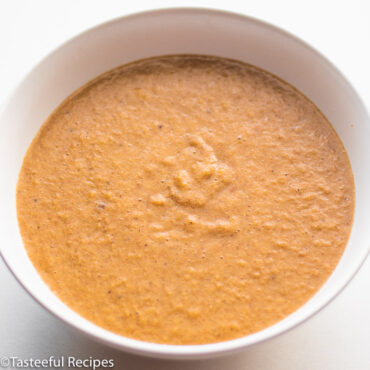 Angled shot of a bowl of Caribbean plantain porrdige