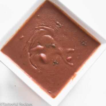 Overhead shot of a bowl of haitian red beans sauce