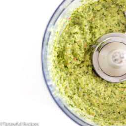 overhead shot of caribbean green seasoning in a food mixer