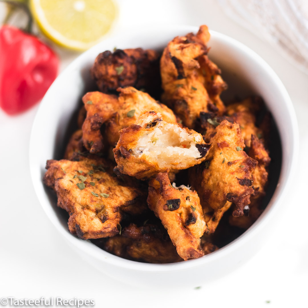 overhead shot of caribbean saltfish fritters in a bowl